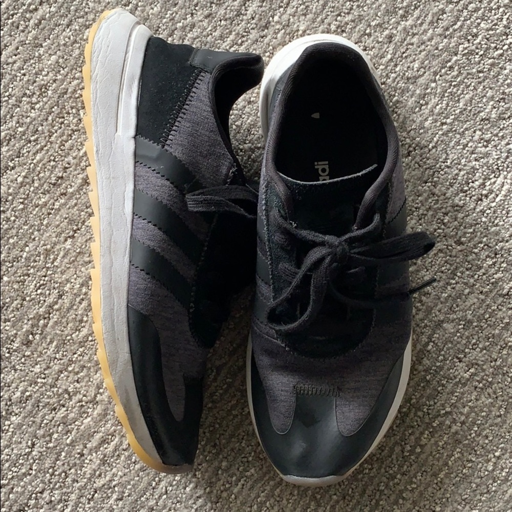 Black on black adidas sneakers